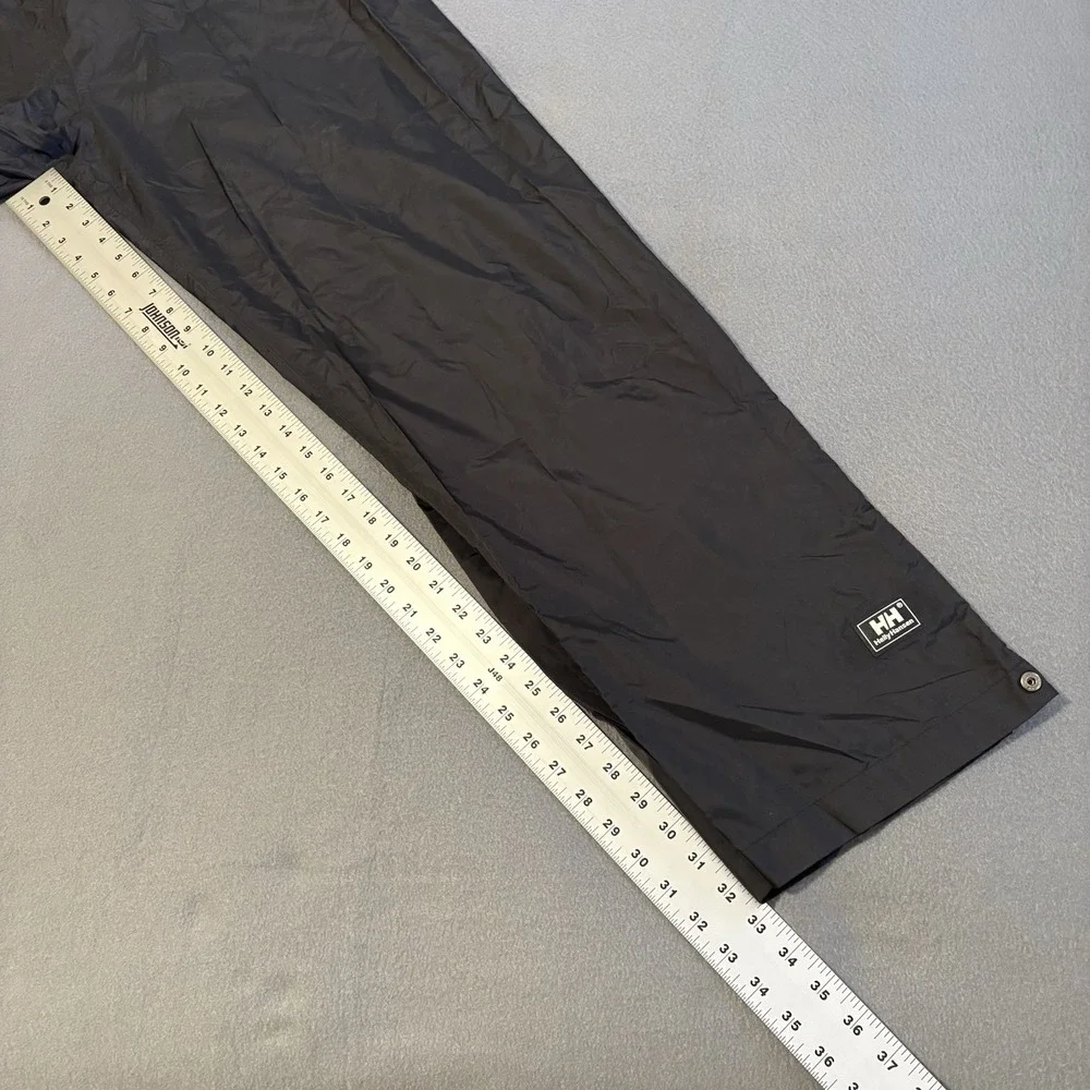 Helly Hansen Packable Hiking Pants Mens XL Black Ankle Zip Wide Leg Baggy Logo